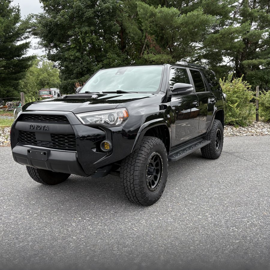 Black Toyota 4Runner after ceramic coating — deep, glossy finish